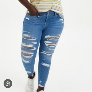 NWOT Torrid Jegging Jean Super Soft Medium Wash With Fishnet sz. 16